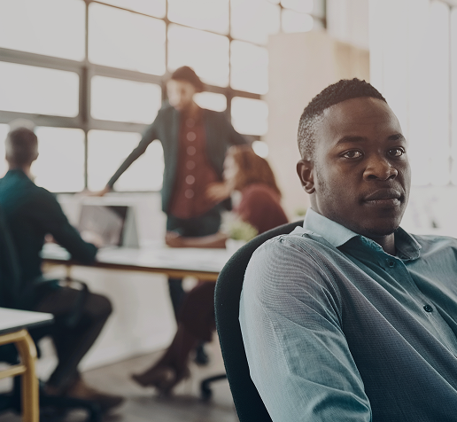 Sudatel team collaborating in a meeting room