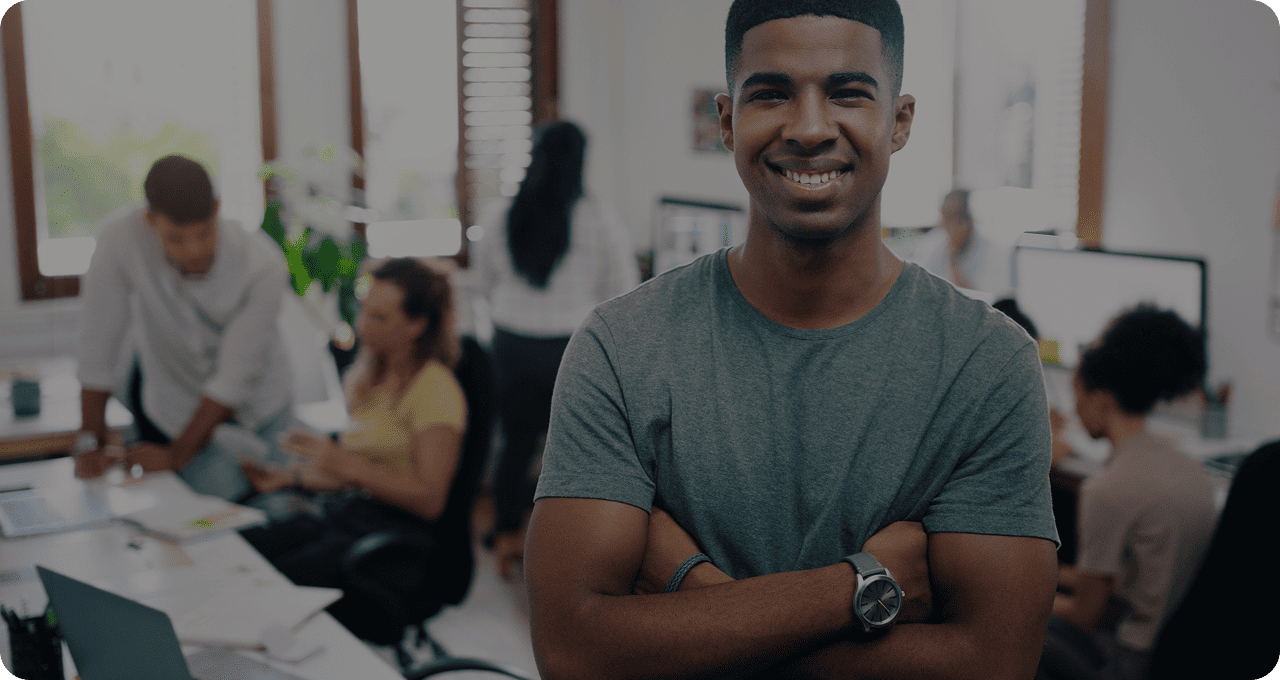 Four Sudatel employees standing together, representing our employee experience