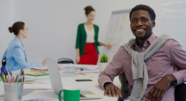 Modern Sudatel office space with employees working